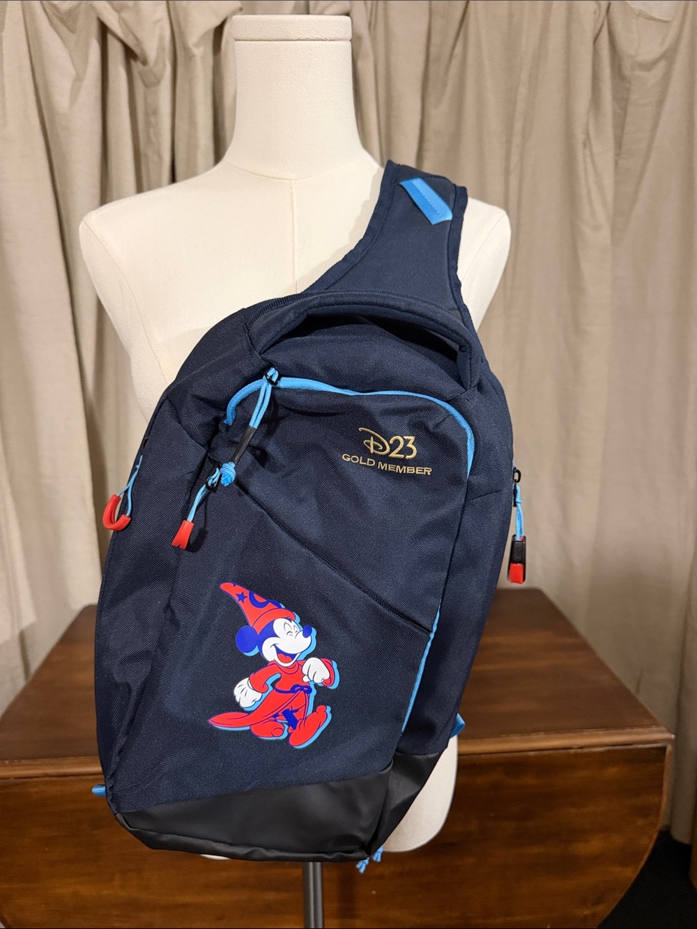Disney Navy Sling Bag with Red & Light Blue Accents